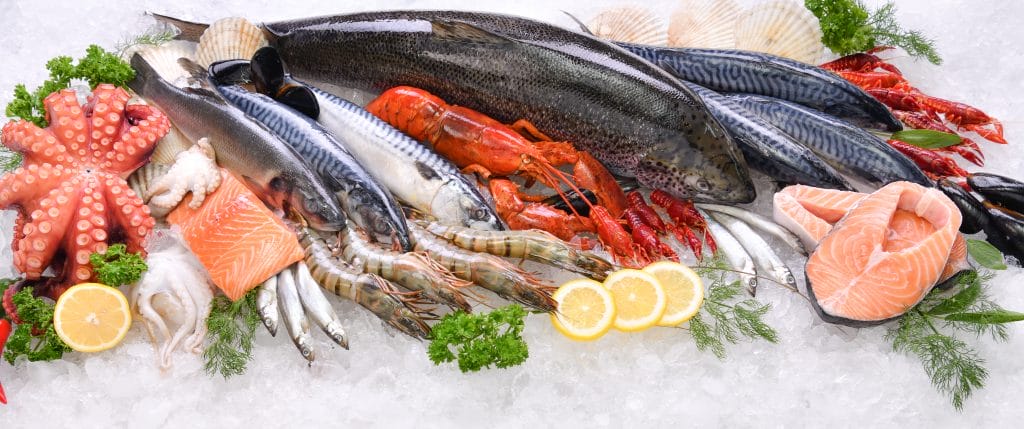 Array of seafood displayed on ice.