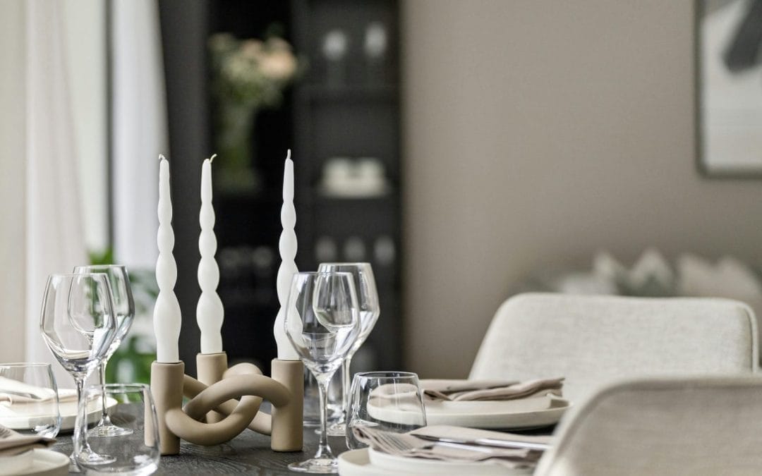 Feature image for blog article titled 10 Essential Questions to Ask Before Hiring a Private Chef in South Florida. Shows part of an elegant table setting in neutral colors in a home.
